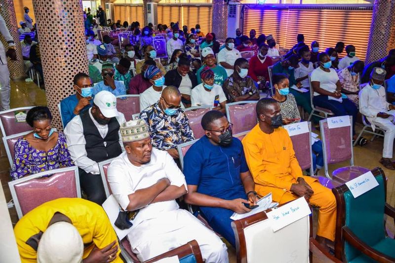 A packed hall of seated delegates at the summit.